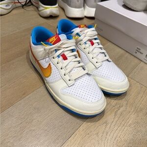 Nike White and Blue Shoes with Red and Yellow Details